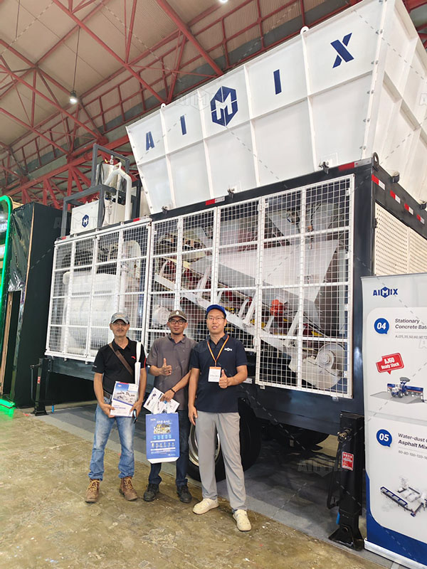 customer at ADEXCO 2025 visits and explores the compact mobile batching plant Indonesia